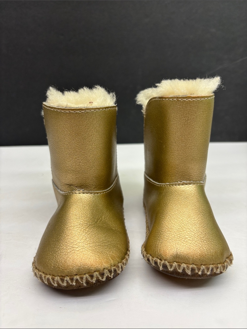 UGG Baby’s Metallic Gold Faux-Shearling Boots, sz 4-5, box 77